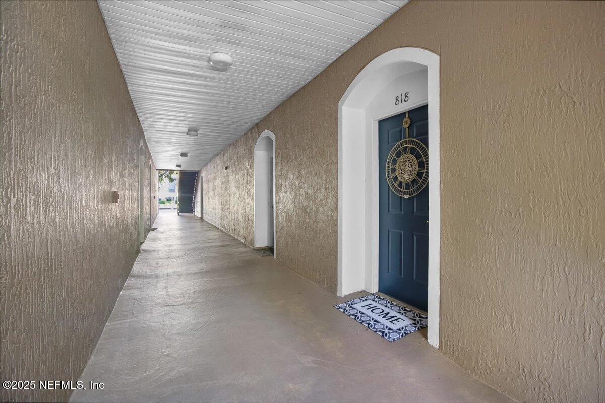 10550 Baymeadows Road, Unit 818 Jacksonville, FL 32256 - Photo 51 of 62 WALKWAY TO FRONT OF BUILDING