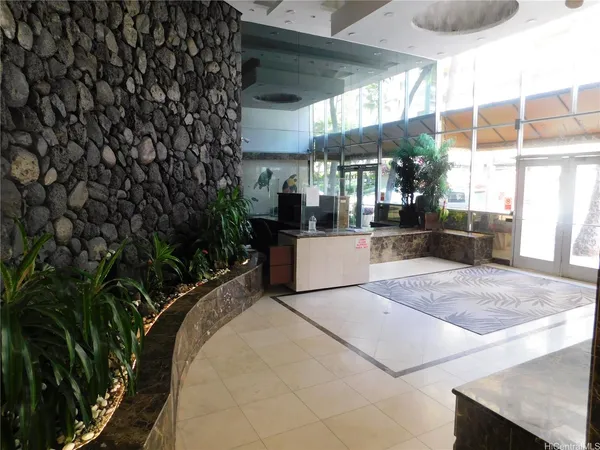 a view of a living room and kitchen