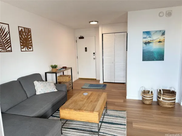 a living room with furniture and a table