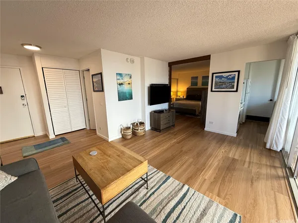 a living room with a couch and a table