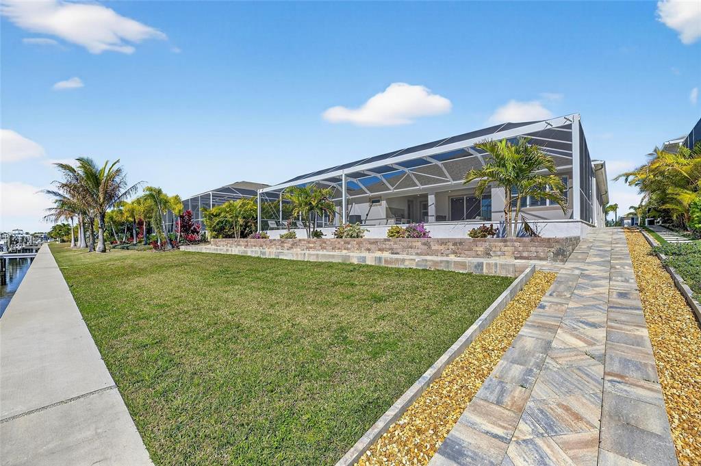 994 Signet Drive Apollo Beach, FL 33572 - Photo 65 of 98 a view of a swimming pool with a patio