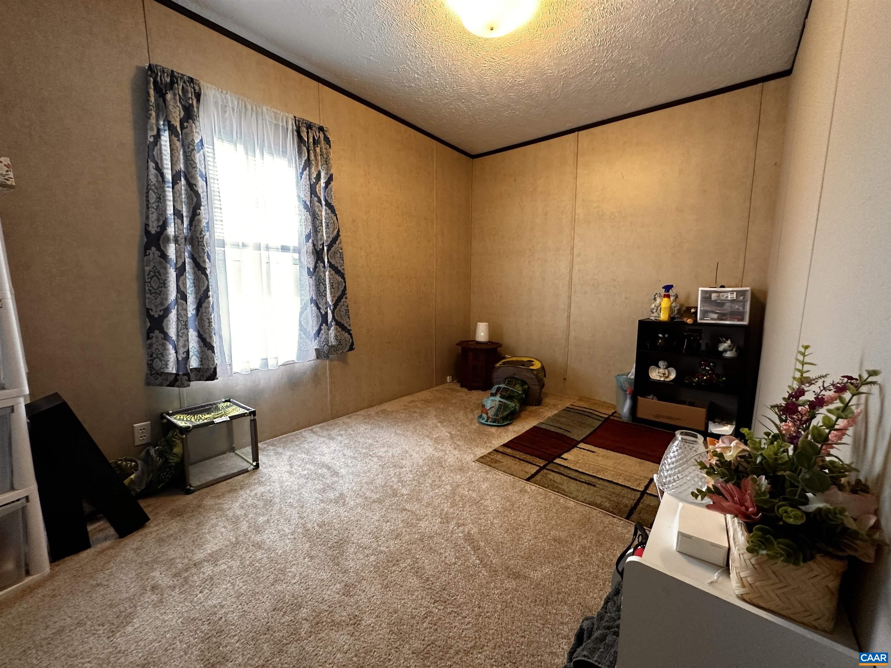 1625 South Constitution Route Dillwyn, VA 23936 - Photo 16 of 30 a room with gym equipment and a large window