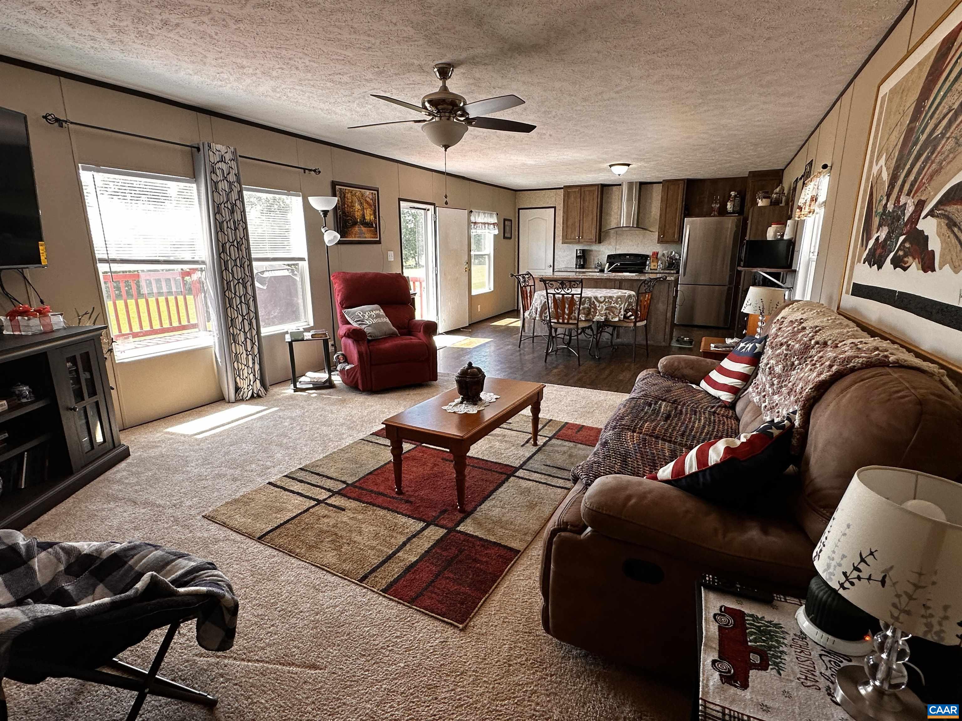 1625 South Constitution Route Dillwyn, VA 23936 - Photo 4 of 30 a living room with furniture ceiling fan and a window
