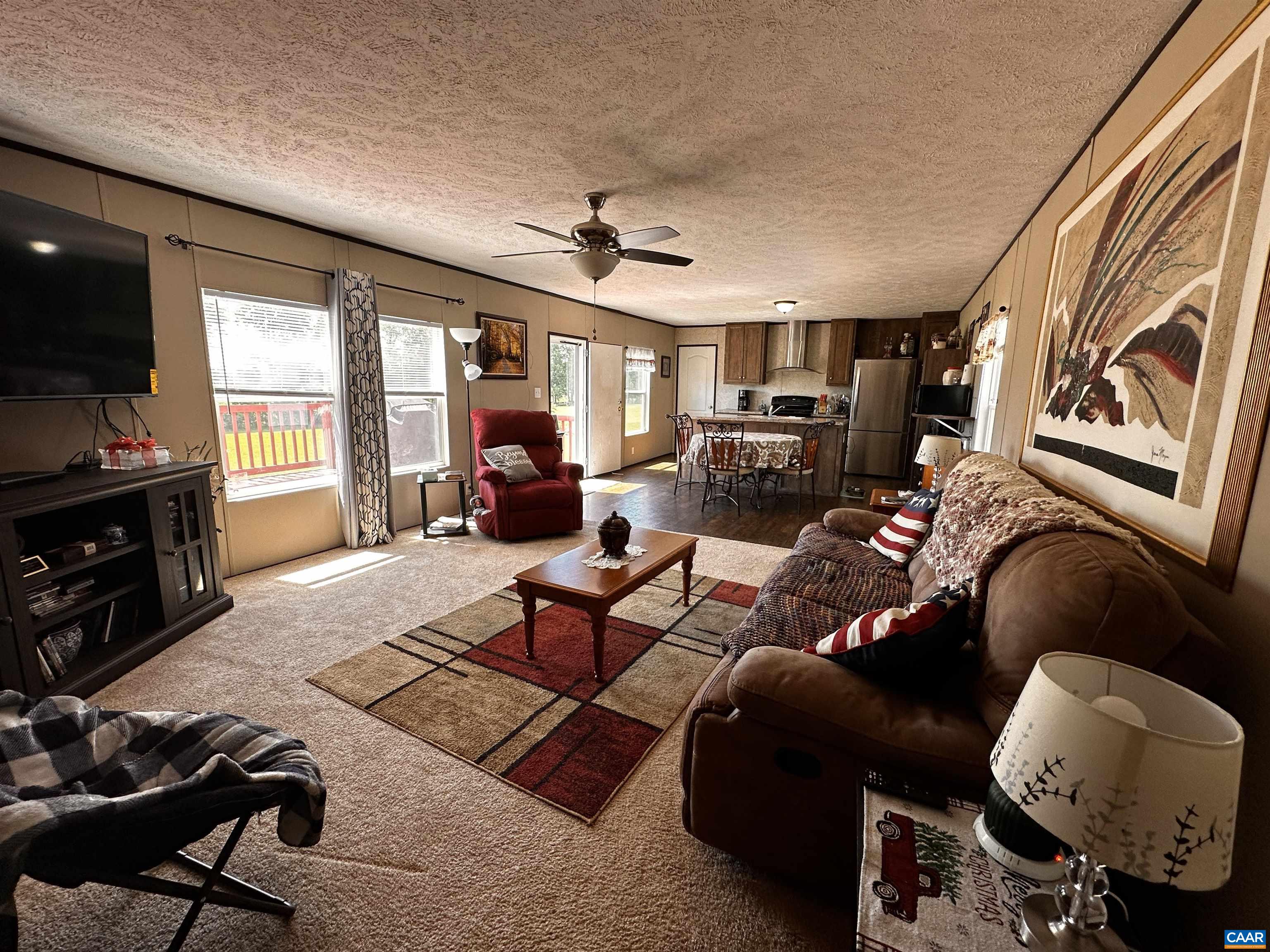 1625 South Constitution Route Dillwyn, VA 23936 - Photo 7 of 30 a living room with furniture and a flat screen tv