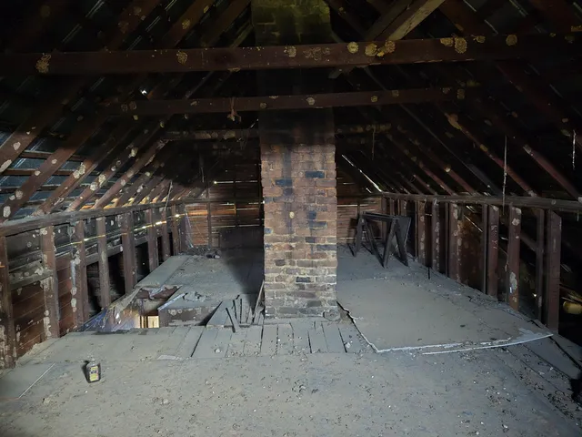 a room with furniture and a window