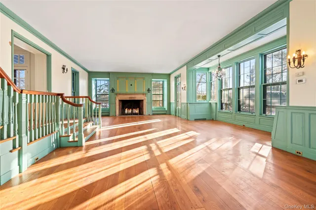 a view of an empty room with glass door