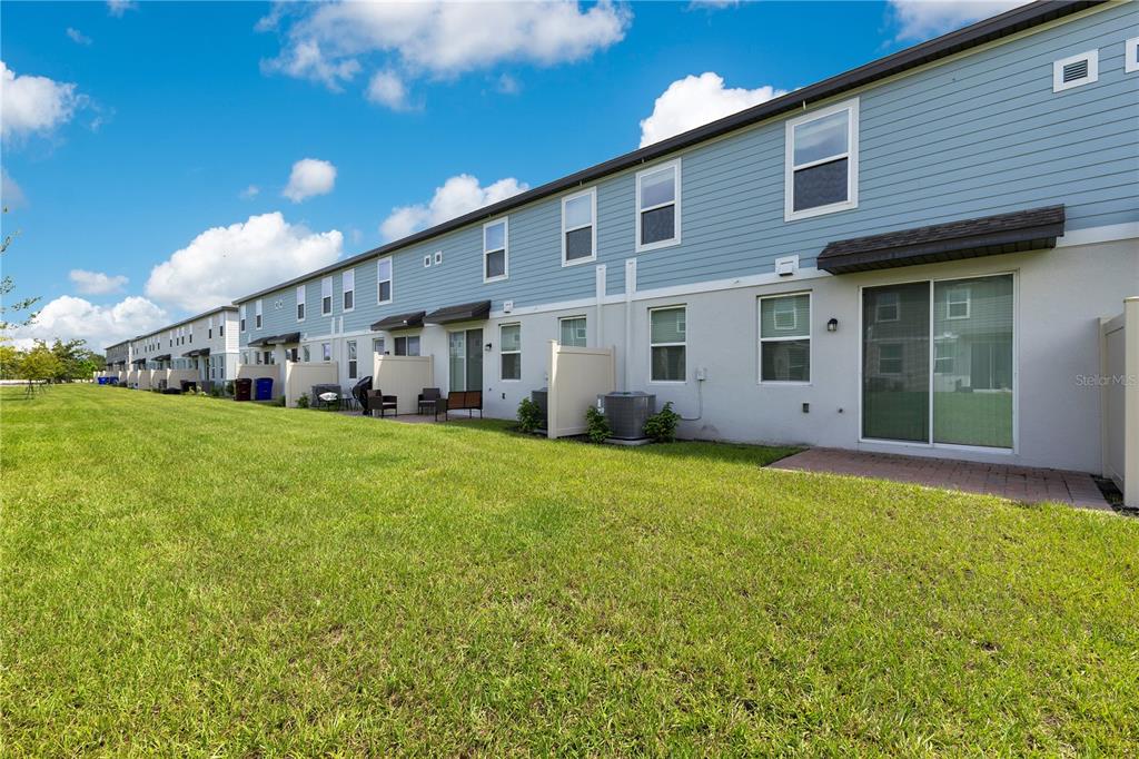 4367 Ranch House Road St. Cloud, FL 34772 - Photo 18 of 29 a front view of house with yard and green space