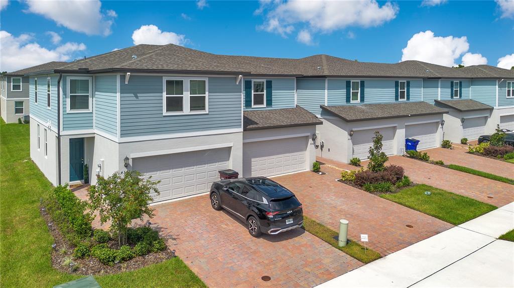 4367 Ranch House Road St. Cloud, FL 34772 - Photo 22 of 29 a front view of a house with a yard