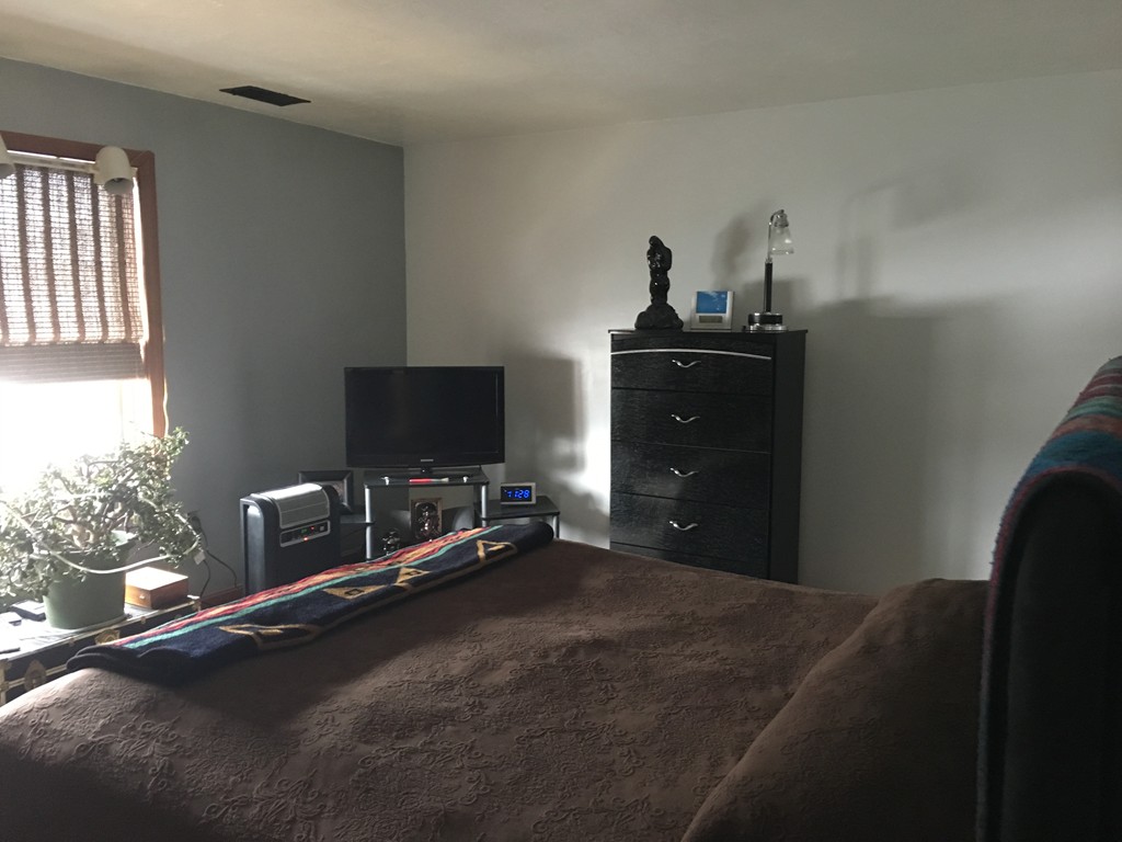 3 Highcrest Park, Unit 3 Webster, MA 01570 - Photo 8 of 14 a bedroom with a bed and a flat screen tv