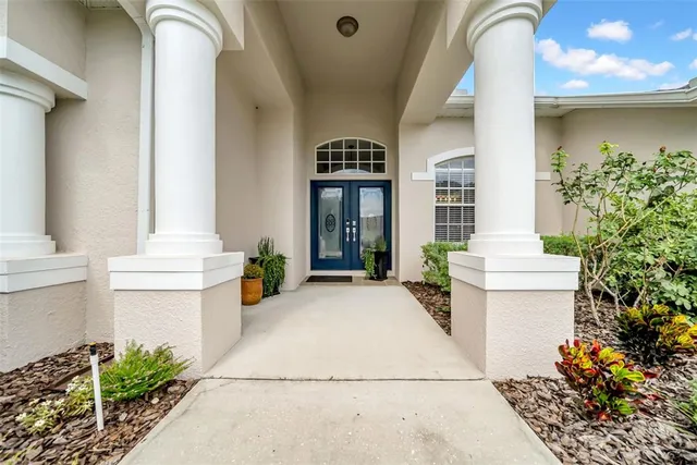 a view of a livingroom with furniture and a window