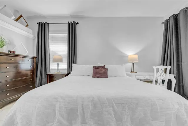 a view of field with trees in the background