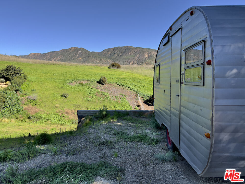 Calpine Drive Malibu, CA 90265 - Photo 9 of 10 a view of a two dinning table and chairs in the yard