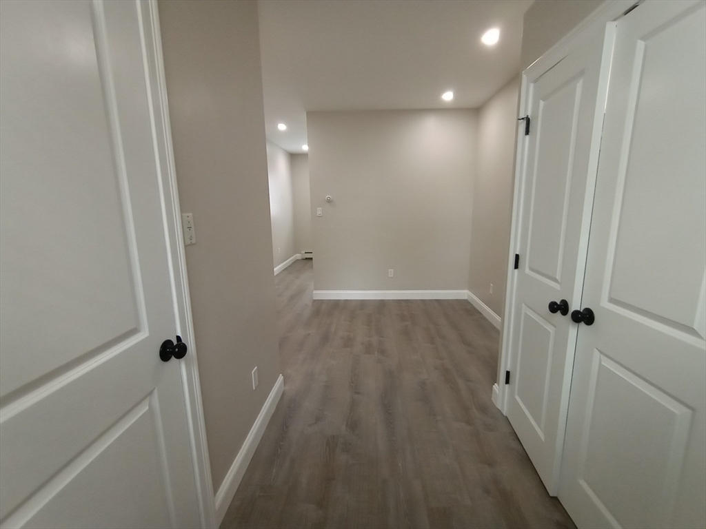 95 Cottage Street, Unit A Boston, MA 02128 - Photo 9 of 18 a view of a hallway