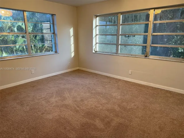 an empty room with a window