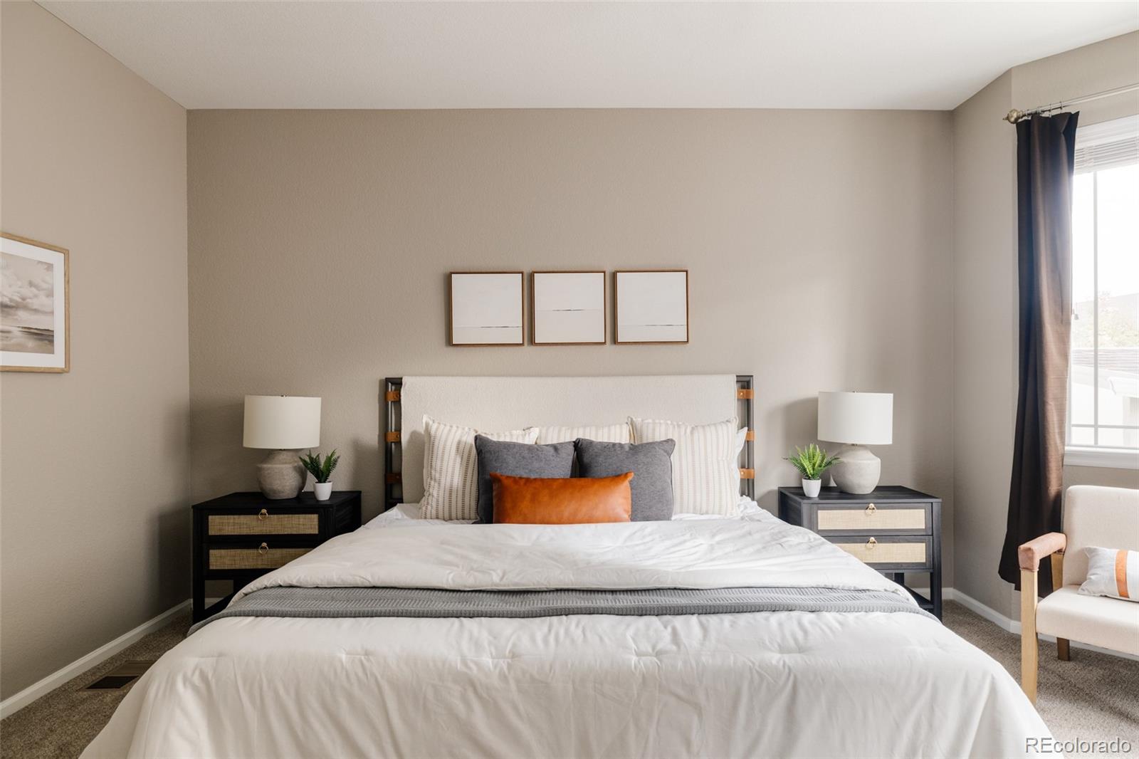 220 South Ider Way Aurora, CO 80018 - Photo 13 of 28 a bedroom with a bed and window