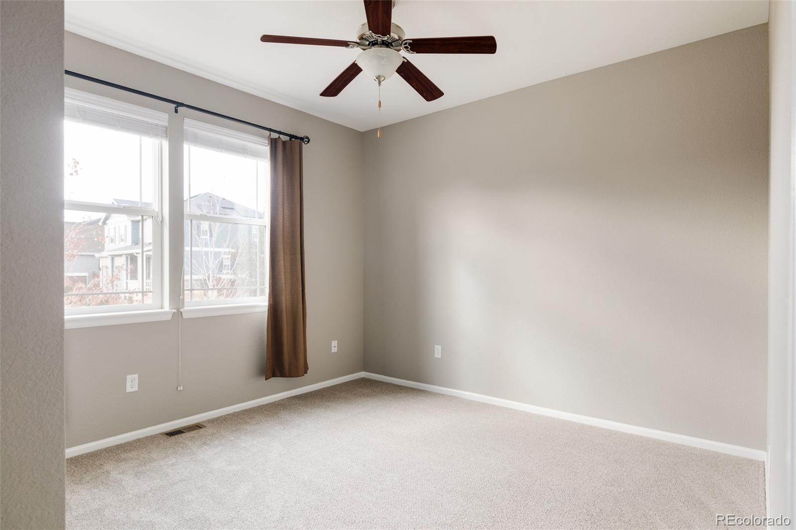 220 South Ider Way Aurora, CO 80018 - Photo 16 of 28 a view of an empty room with a window