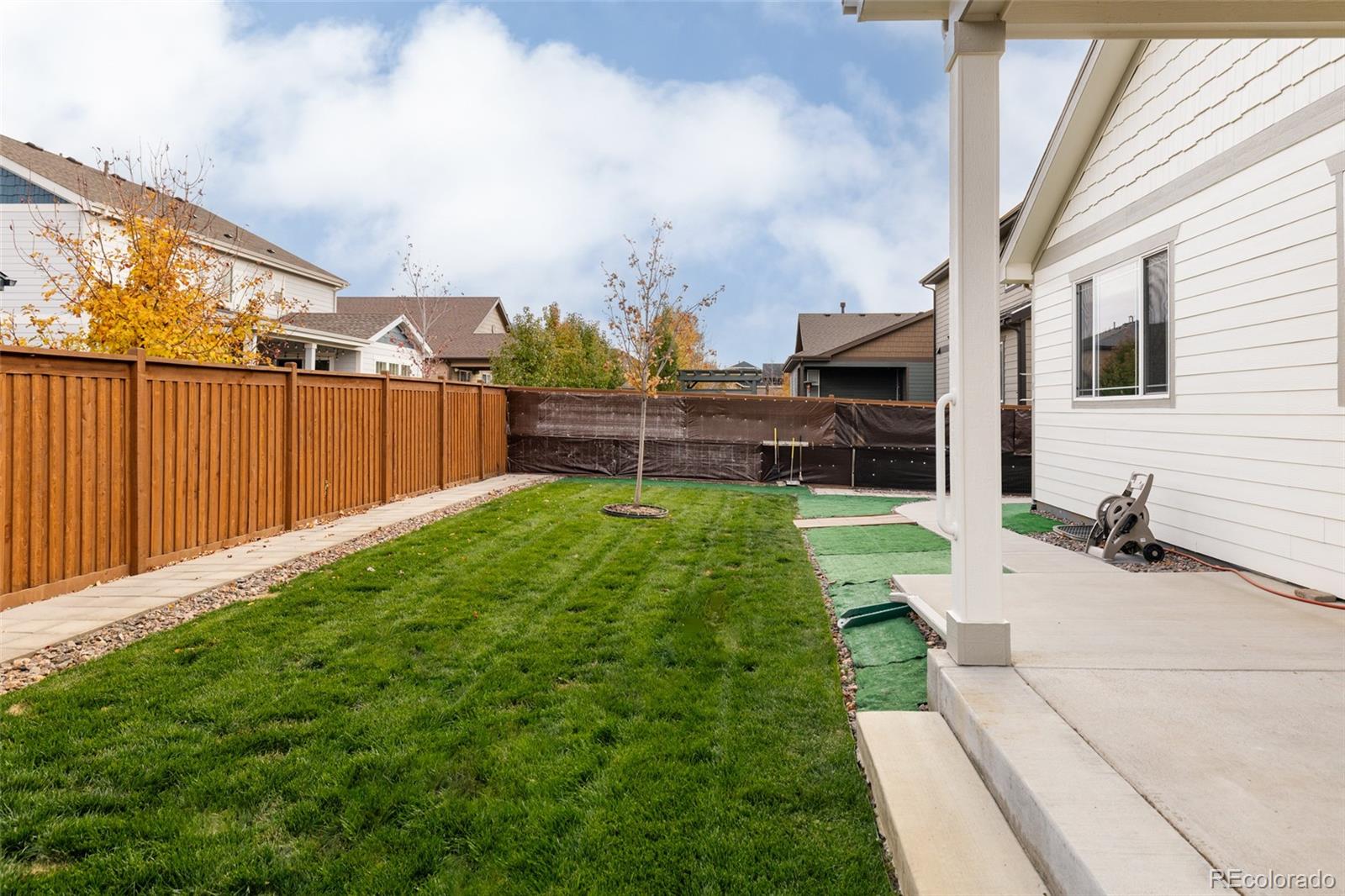220 South Ider Way Aurora, CO 80018 - Photo 24 of 28 a view of backyard with swimming pool