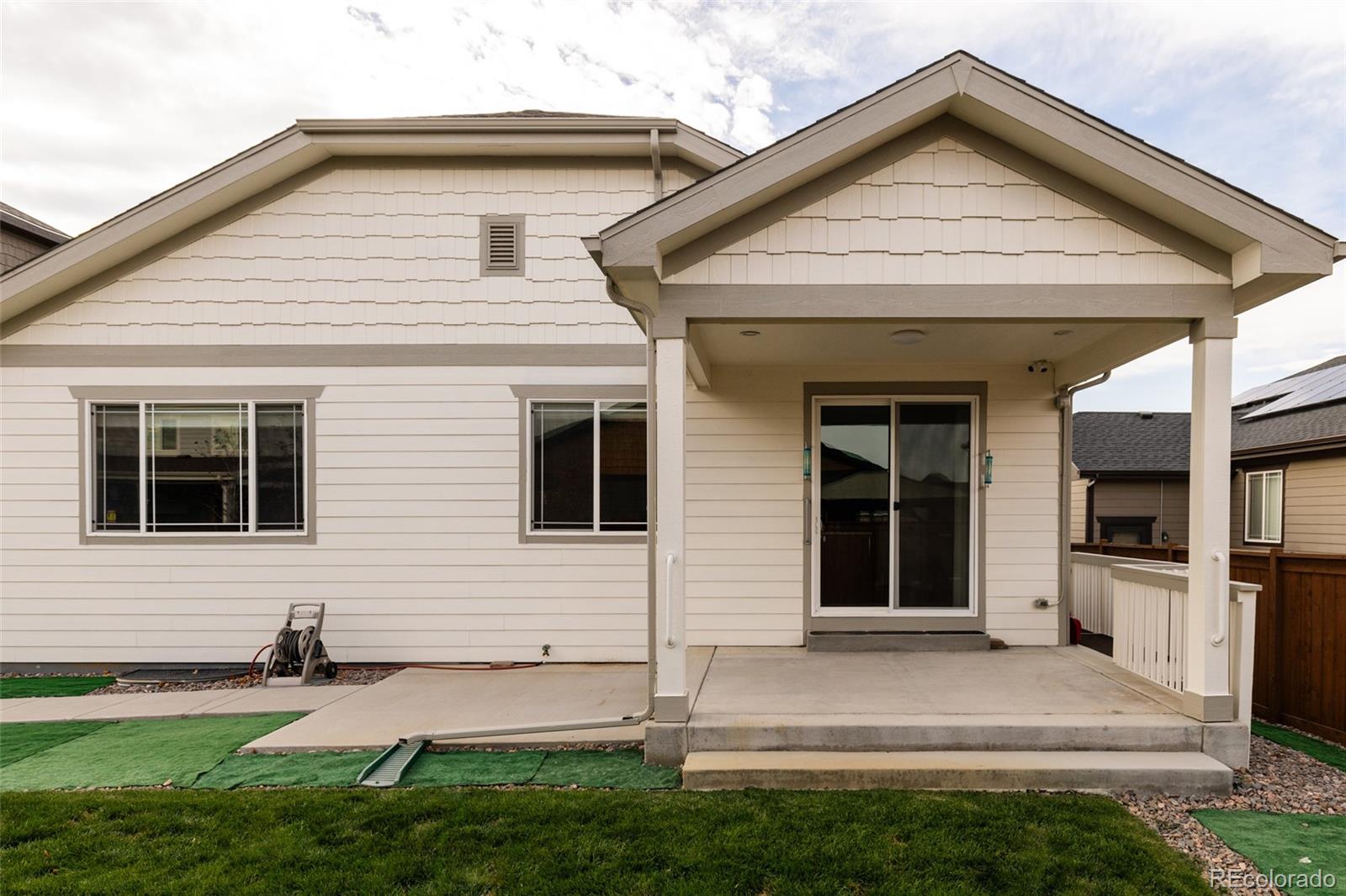 220 South Ider Way Aurora, CO 80018 - Photo 25 of 28 a view of front of house with a yard