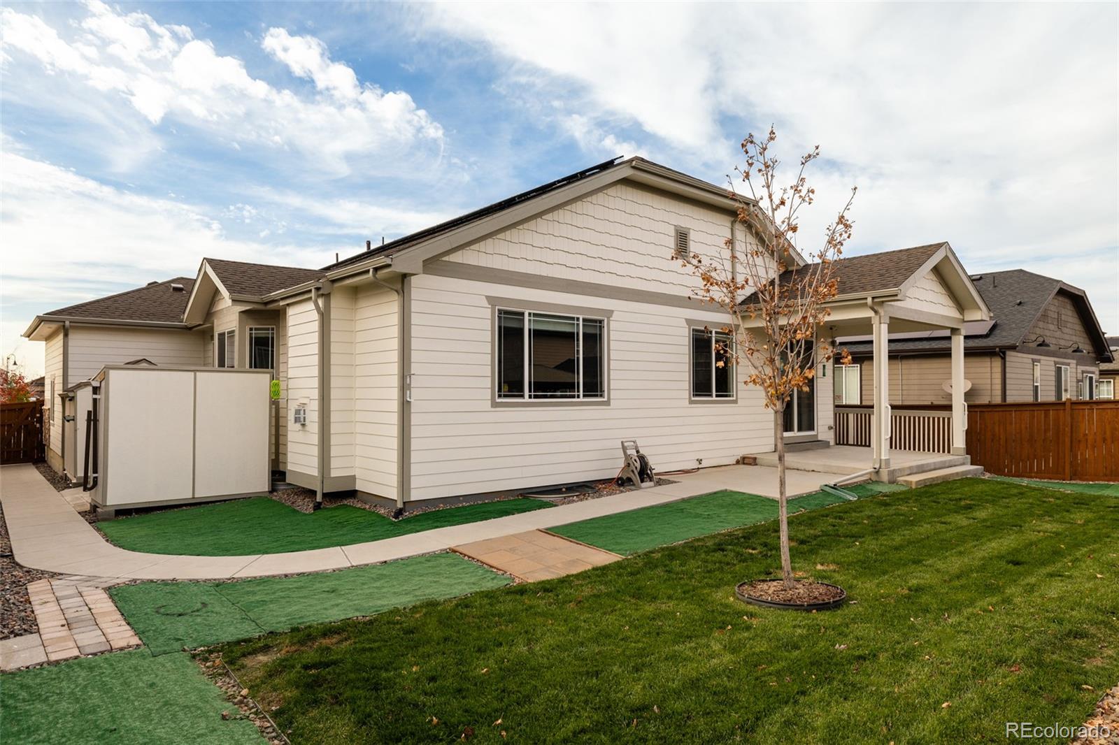 220 South Ider Way Aurora, CO 80018 - Photo 26 of 28 a view of a yard in front of house