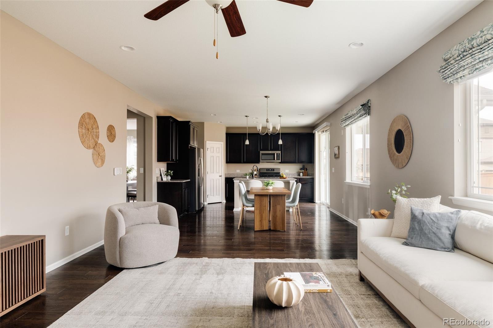 220 South Ider Way Aurora, CO 80018 - Photo 4 of 28 a living room with furniture and a large window