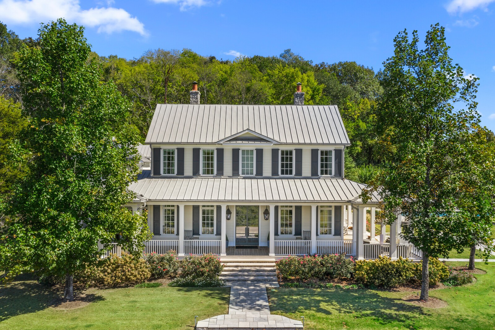 3377 Bailey Road Franklin, TN 37064 - Photo 30 of 49 a front view of a house with garden and trees