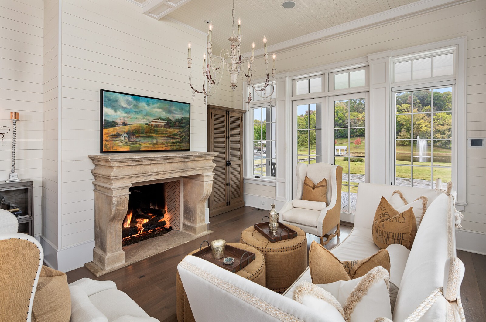 3377 Bailey Road Franklin, TN 37064 - Photo 33 of 49 a living room with furniture a fireplace and a chandelier