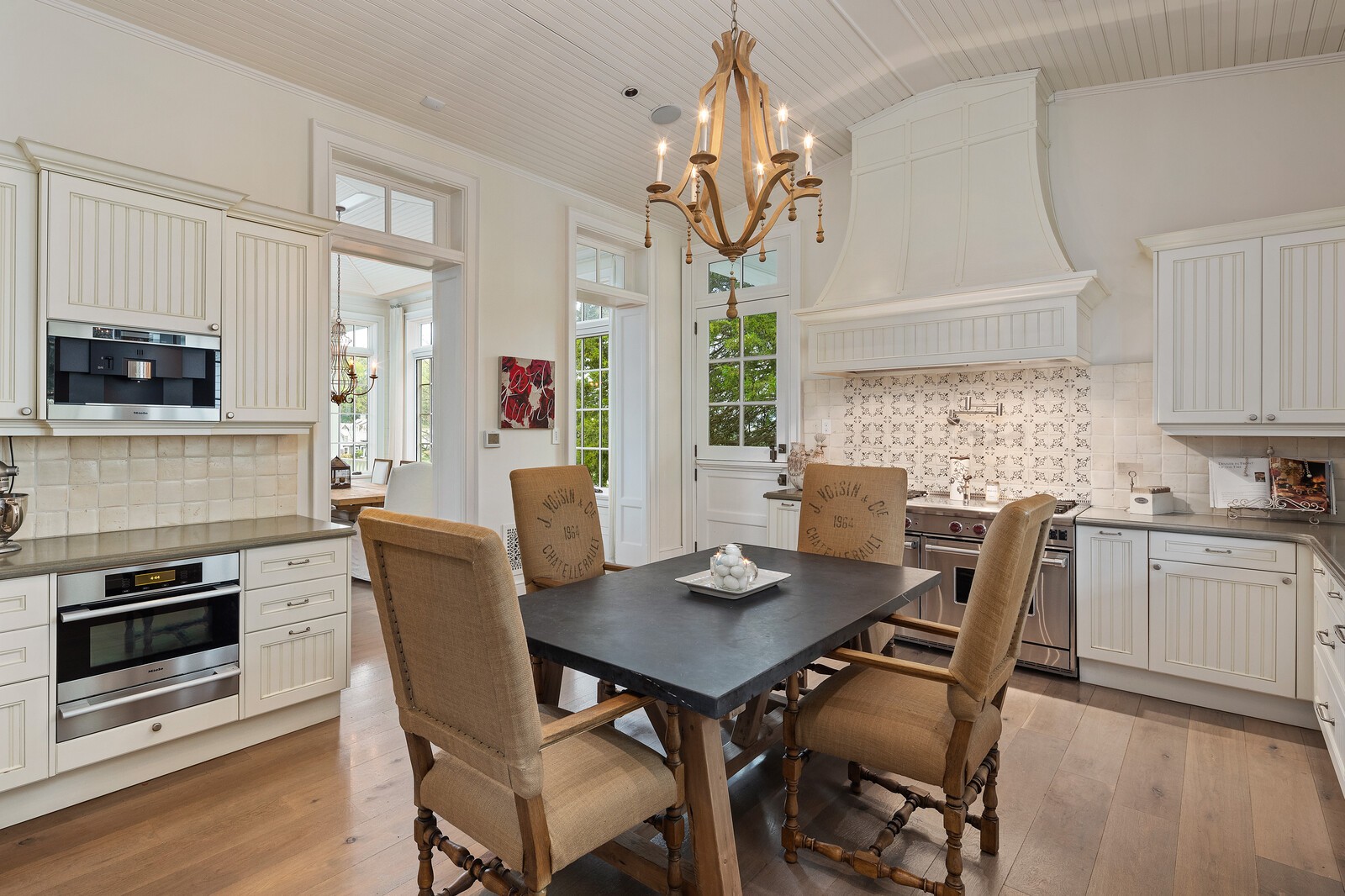 3377 Bailey Road Franklin, TN 37064 - Photo 36 of 49 a view of a dining room with furniture a chandelier and wooden floor