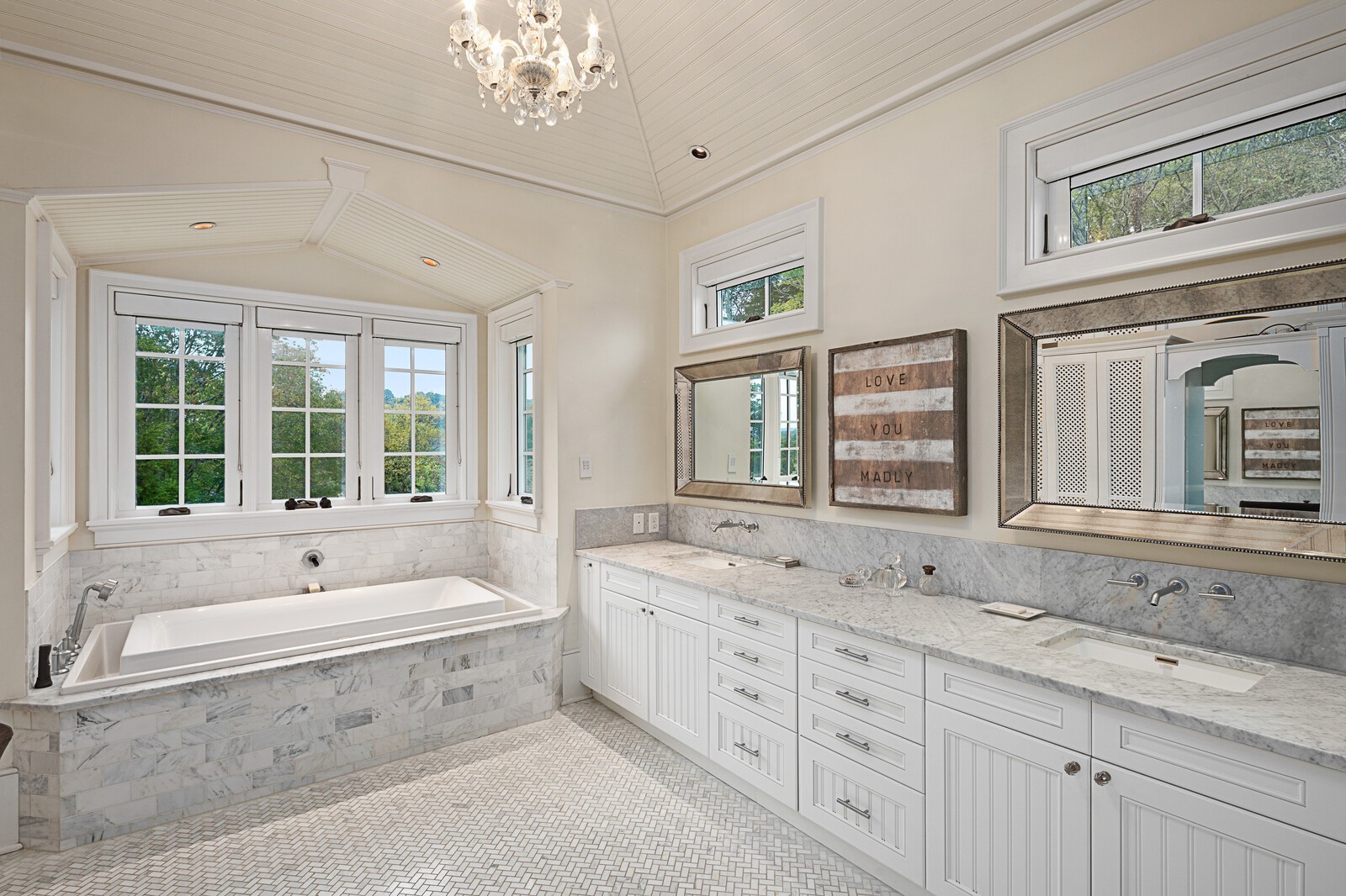 3377 Bailey Road Franklin, TN 37064 - Photo 40 of 49 a bathroom with double vanity sink a bathtub and windows