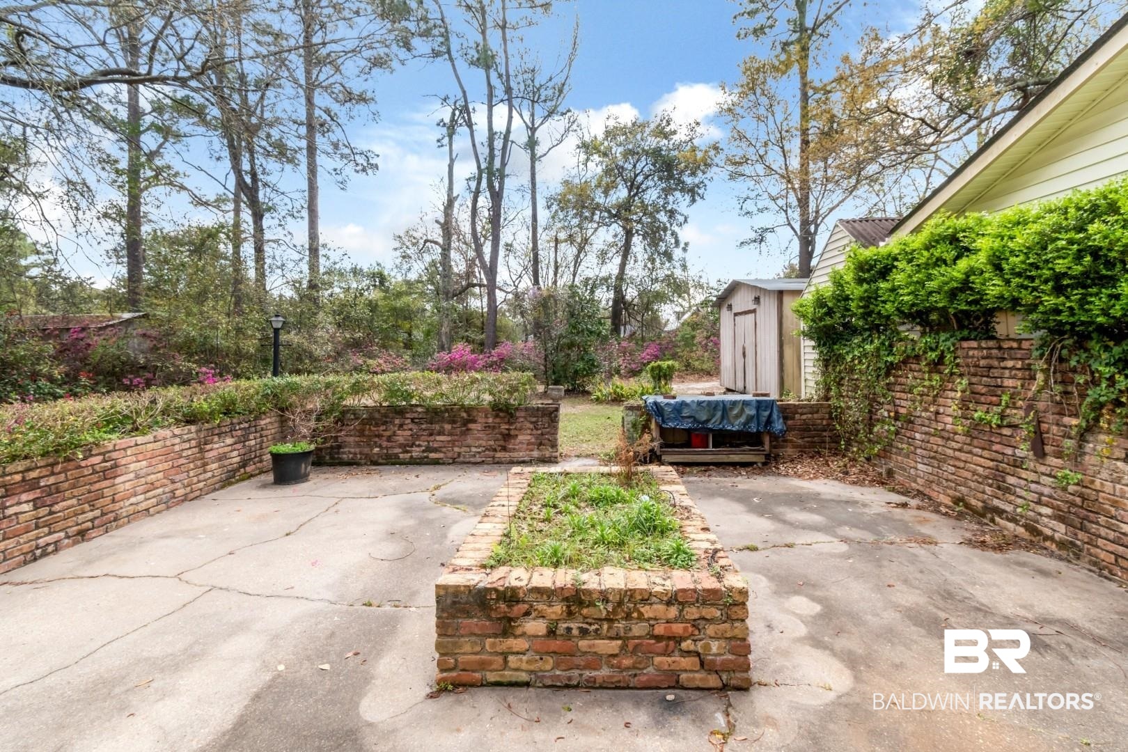3715 South Conway Drive Mobile, AL 36608 - Photo 21 of 24 View of patio / terrace featuring an outbuilding