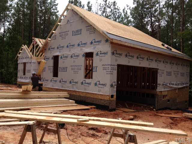 4009 Range Road Stem, NC 27581 - Photo 3 of 6 a view of a house with a balcony