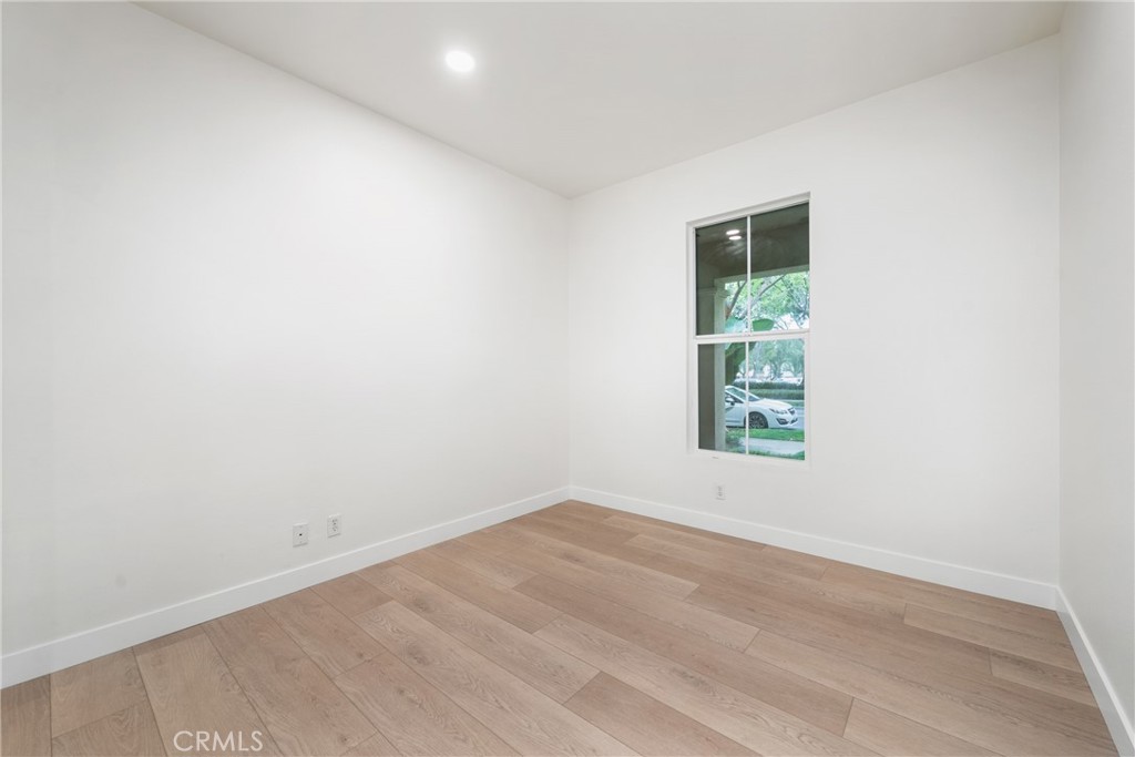 312 Quail Ridge Irvine, CA 92603 - Photo 6 of 21 an empty room with a window