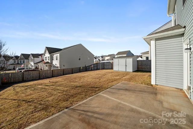 a front view of a house with large windows