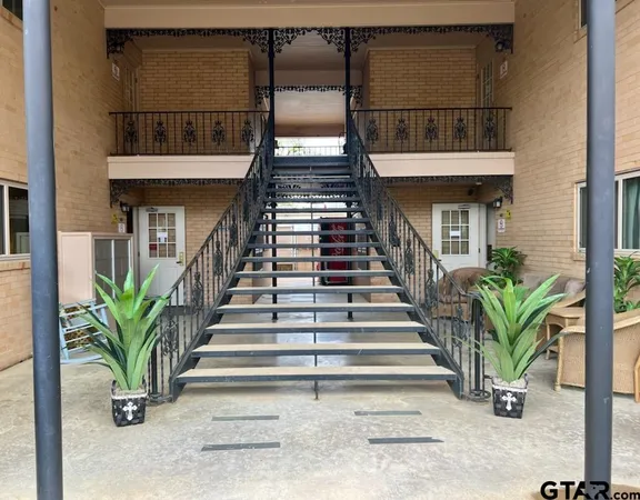 a view of entryway with a front door