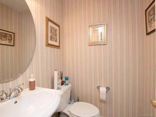 a room with furniture and a flat screen tv