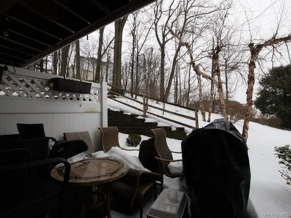 a view of a backyard of the house