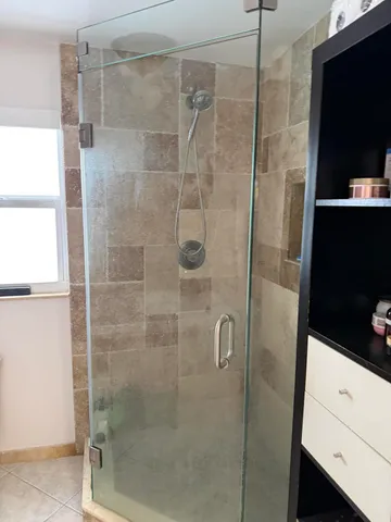 a bathroom with a bathtub and toilet