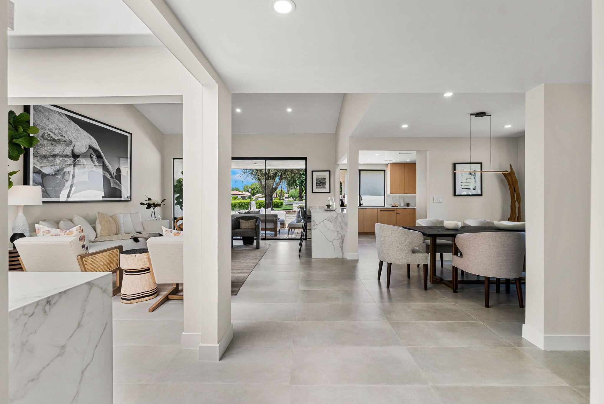 8 Leon Way Rancho Mirage, CA 92270 - Photo 6 of 37 a living room with furniture and a painting on the wall