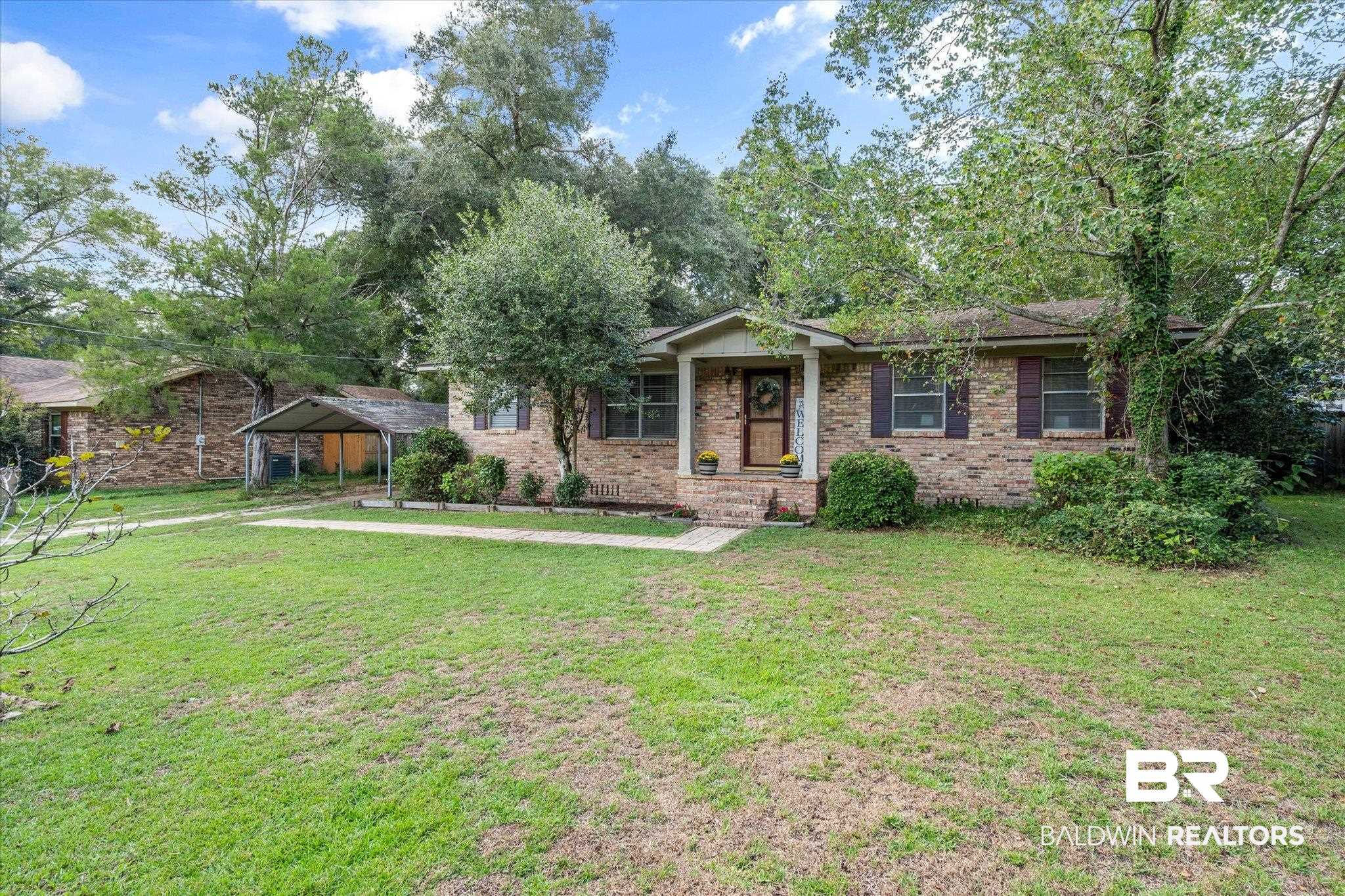 2851 Pinetucky Road Mobile, AL 36618 - Photo 30 of 30 Ranch-style house featuring a front yard and a carport