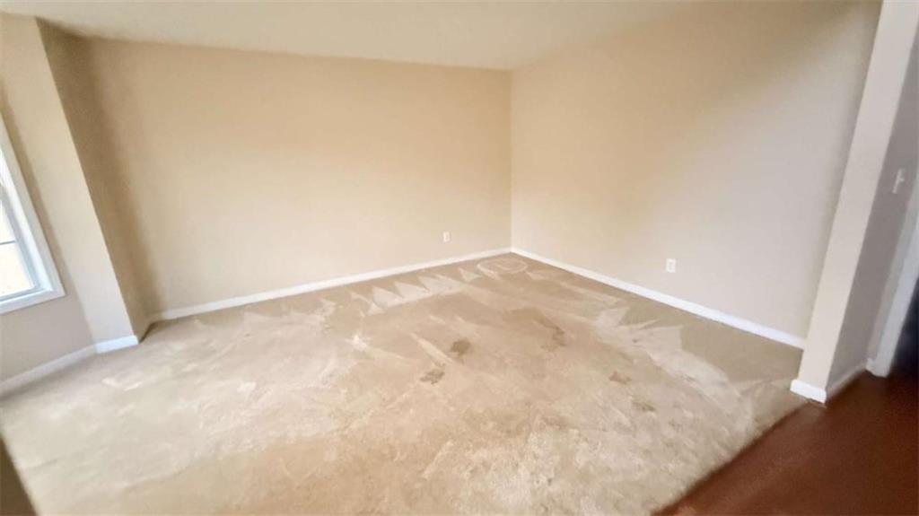 65 Montgomery Court Covington, GA 30016 - Photo 3 of 11 a view of empty room