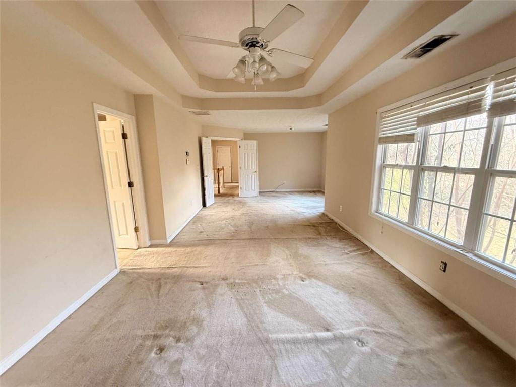 65 Montgomery Court Covington, GA 30016 - Photo 7 of 11 a view of an empty room with a window