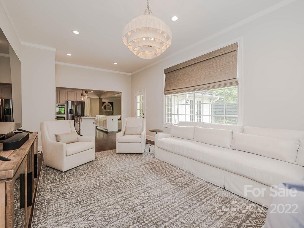 415 Ashworth Road Charlotte, NC 28211 - Photo 15 of 43 a living room with furniture and a large window