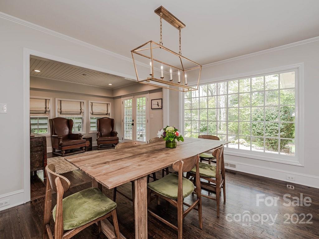 415 Ashworth Road Charlotte, NC 28211 - Photo 20 of 43 a view of a dining room with furniture window and wooden floor