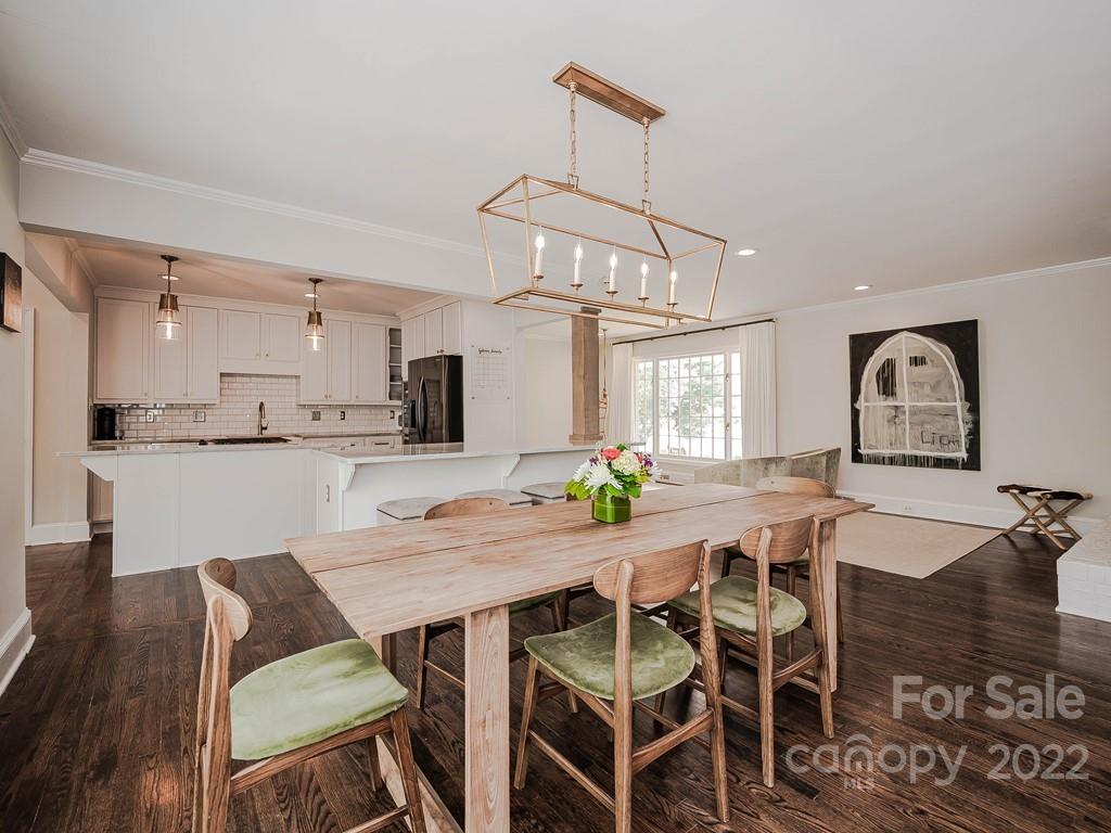 415 Ashworth Road Charlotte, NC 28211 - Photo 24 of 43 a view of a dining room with furniture