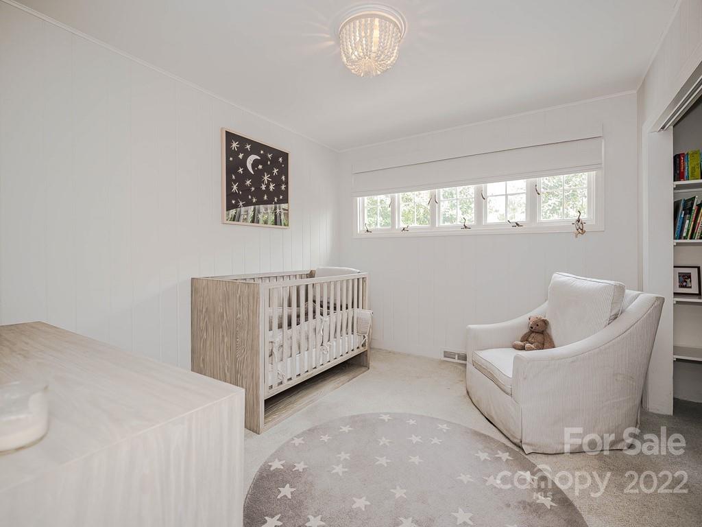 415 Ashworth Road Charlotte, NC 28211 - Photo 32 of 43 a bed and a couch in a room