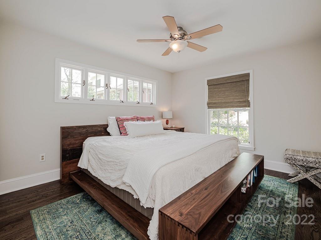 415 Ashworth Road Charlotte, NC 28211 - Photo 34 of 43 a bed sitting in a bedroom next to a window
