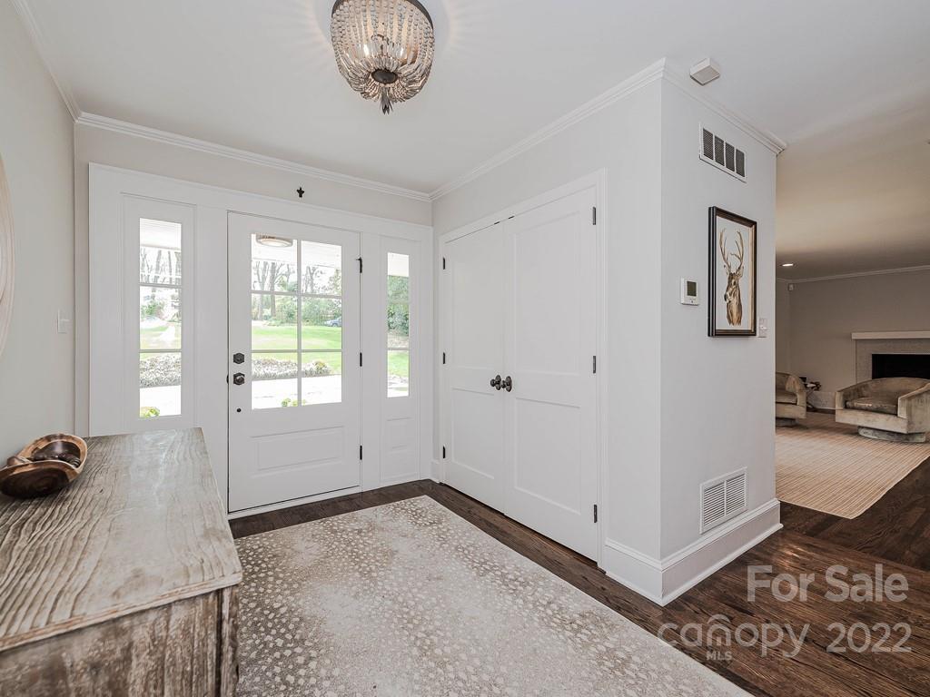 415 Ashworth Road Charlotte, NC 28211 - Photo 4 of 43 a view of a livingroom with wooden floor and a window