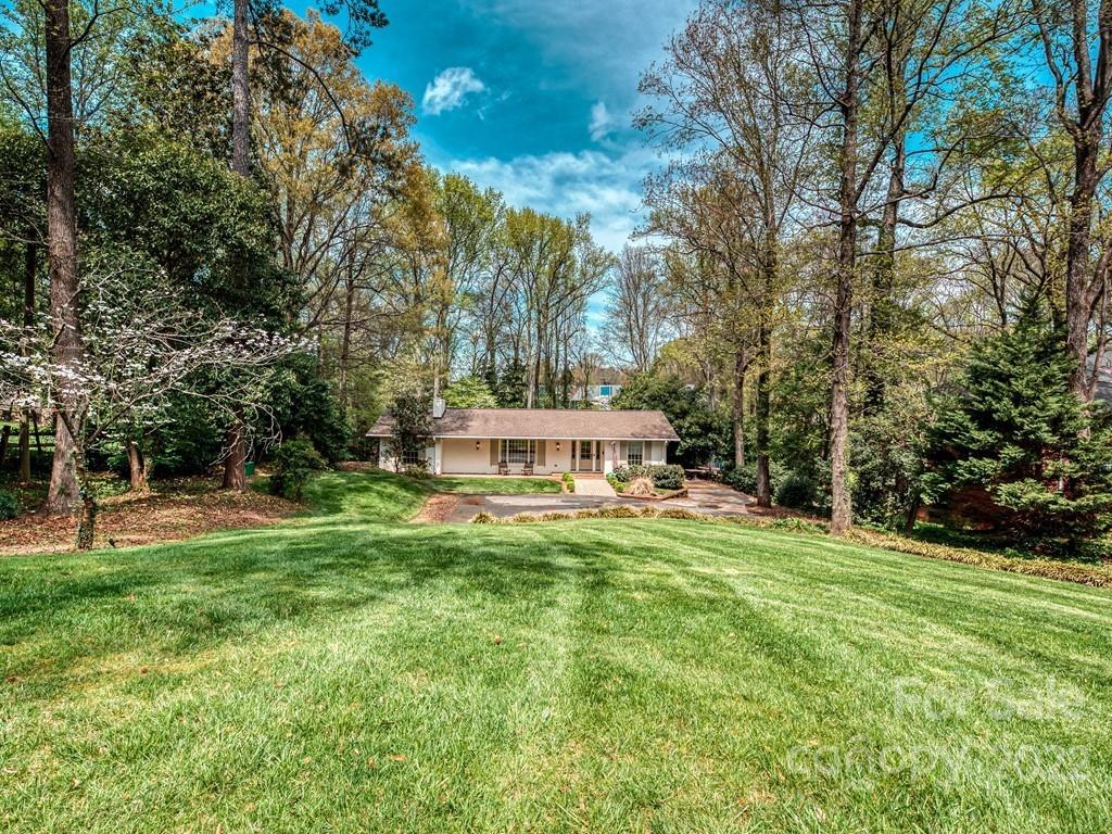 415 Ashworth Road Charlotte, NC 28211 - Photo 42 of 43 a view of a house with a yard