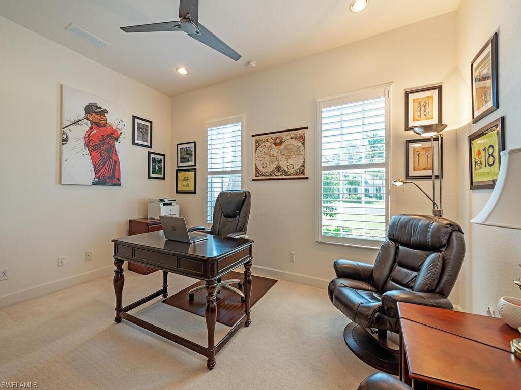 16105 Parque Lane Naples, FL 34110 - Photo 12 of 34 a workspace with furniture and a window