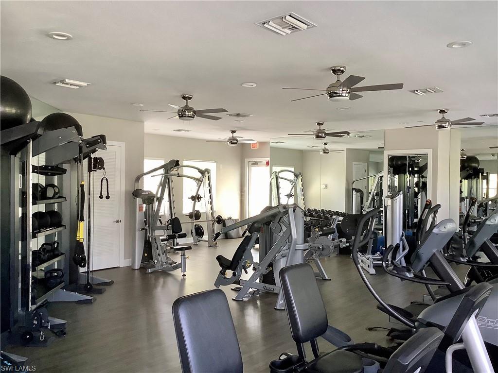 16105 Parque Lane Naples, FL 34110 - Photo 27 of 34 a view of a room with gym equipment