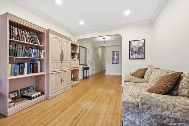 a view of a livingroom with furniture and a window